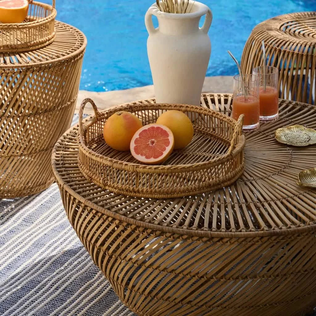 Stylish round outdoor coffee table Dubai in garden setting