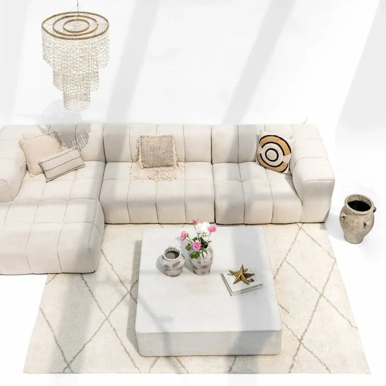 Living room furniture in a Dubai apartment with a sofa and coffee table