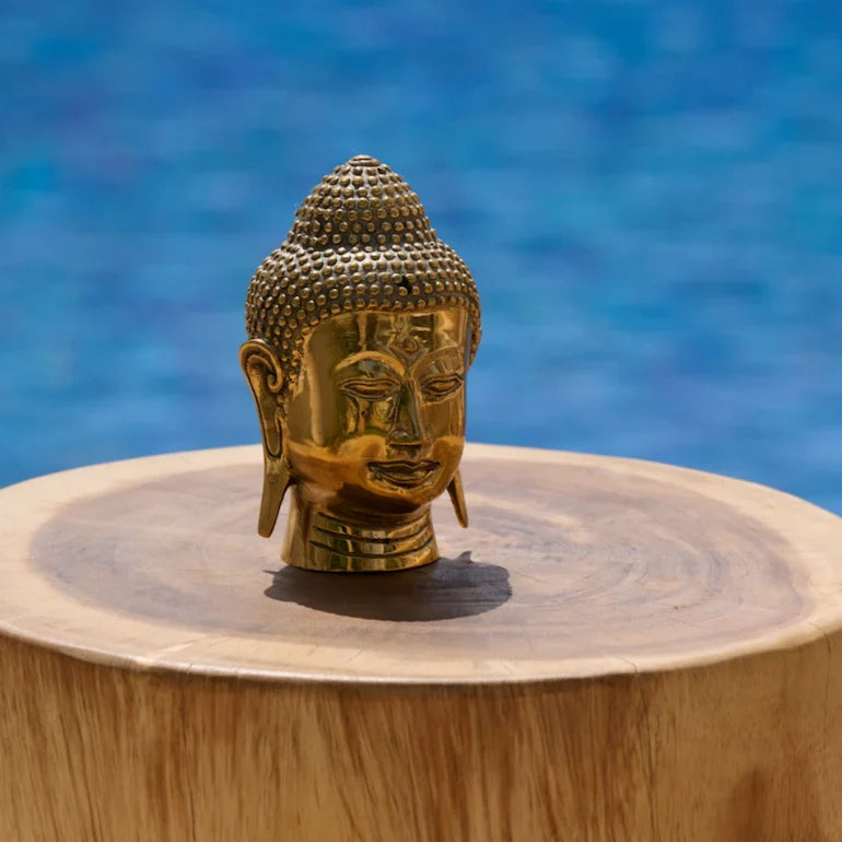 Bronze figurines and accents styled on a console - luxury home decor Dubai