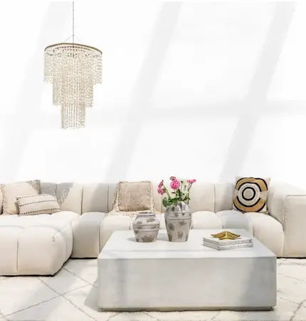 Apartment furniture in a rented Dubai flat with sofa, rug and lamps