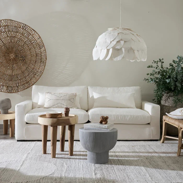 Modern hanging pendant lights in living room setting