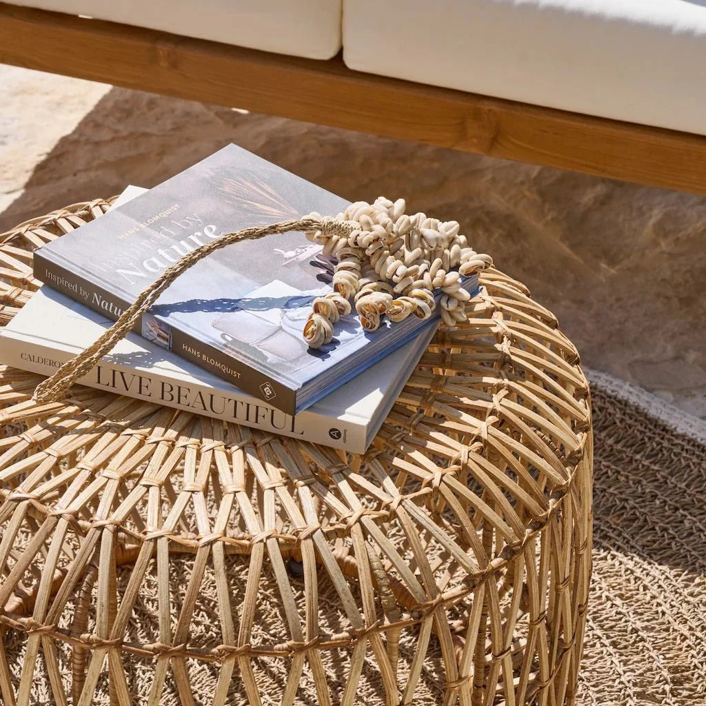 Bali bedroom in Dubai home with rattan bedside table and natural textures
