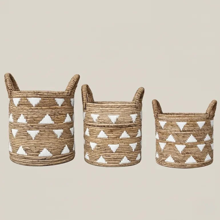 Rattan laundry basket and woven storage baskets in a Dubai apartment