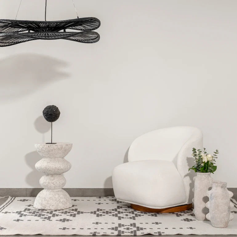 Accent chair styled in a neutral Dubai living room