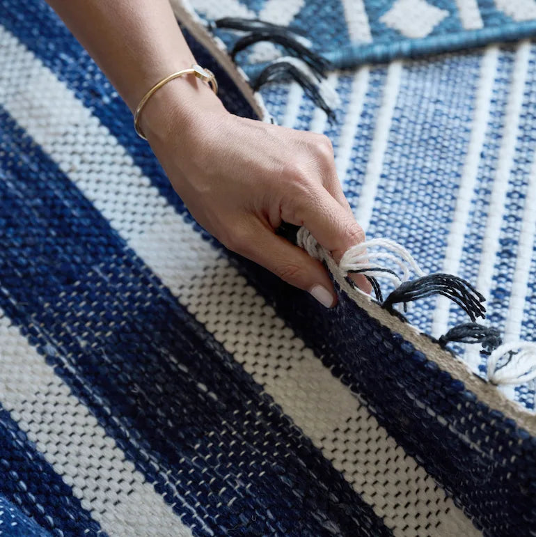 Handmade blue and white rug for stylish Dubai living room interiors