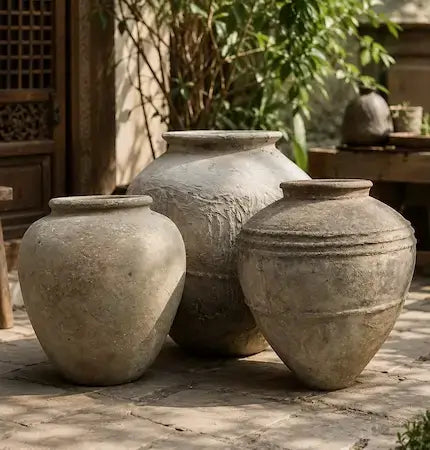 Handmade ceramic vases and decorative bowls styled in a Dubai home interior
