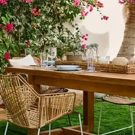 Outdoor dining table set for a winter evening on a Dubai terrace