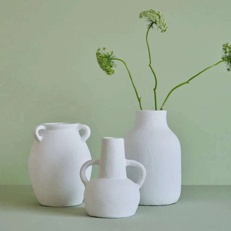Ceramic vase on table with modern home decor styling