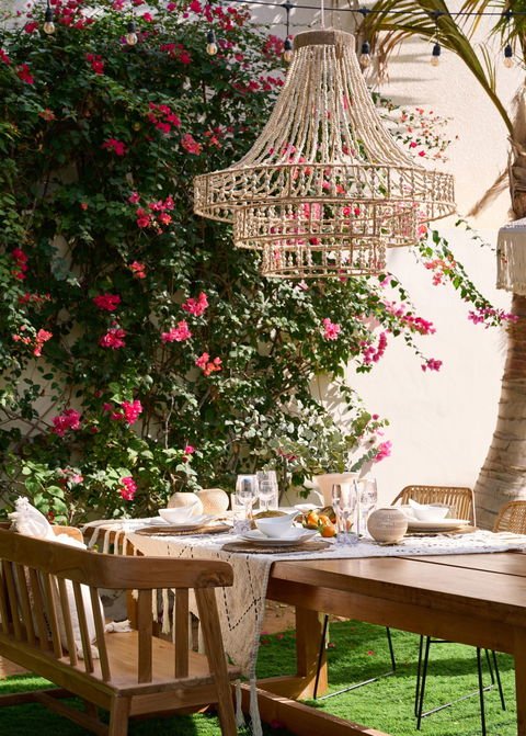 Angelo Rattan Armchair with White Iron Leg
