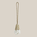 Beaded tassel with white shell