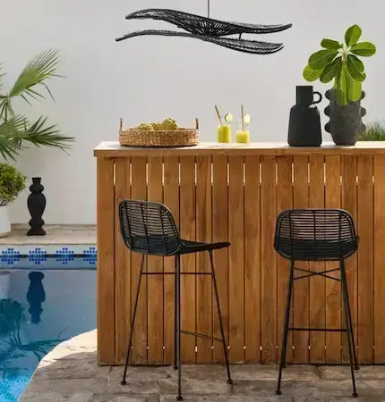 Black rattan bar stools with wavy rattan pendant light