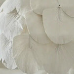 Handcrafted natural pendant light with layered textured panels