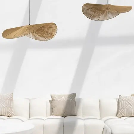 Jute pendant lights above a white boho sofa with natural cushions - Home and Soul Dubai