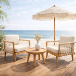 Macrame lounge chair and umbrella set creating a relaxed outdoor living space - Home and Soul