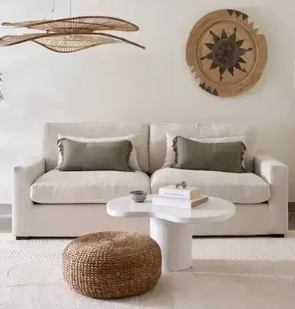 Modern boho living room with sofa woven accents and rattan pendant light