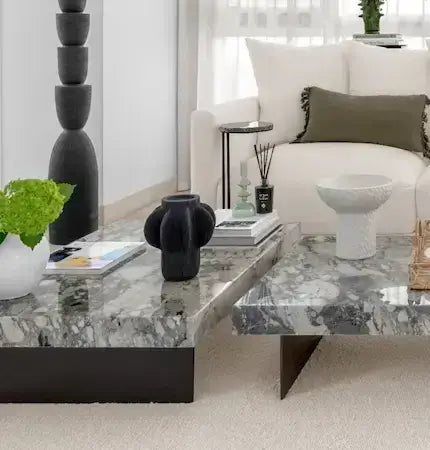 Modern living room with marble coffee table and neutral decor