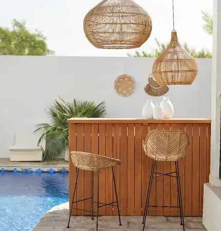 Rattan bar stools and woven pendant lights in boho style