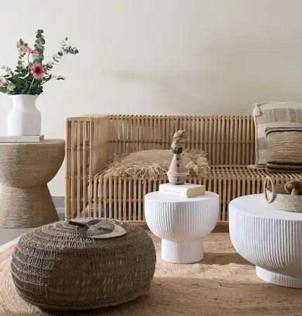 Sale on rattan sofa, white roound coffee tables and jute pouf for Dubai boho living room