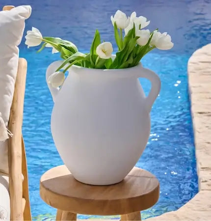 Outdoor decor by the pool in a Dubai home - rattan furniture lifestyle